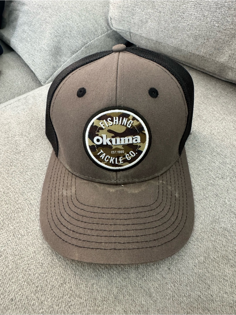 Okuma Fishing Tackle Co. Brown Trucker Hat